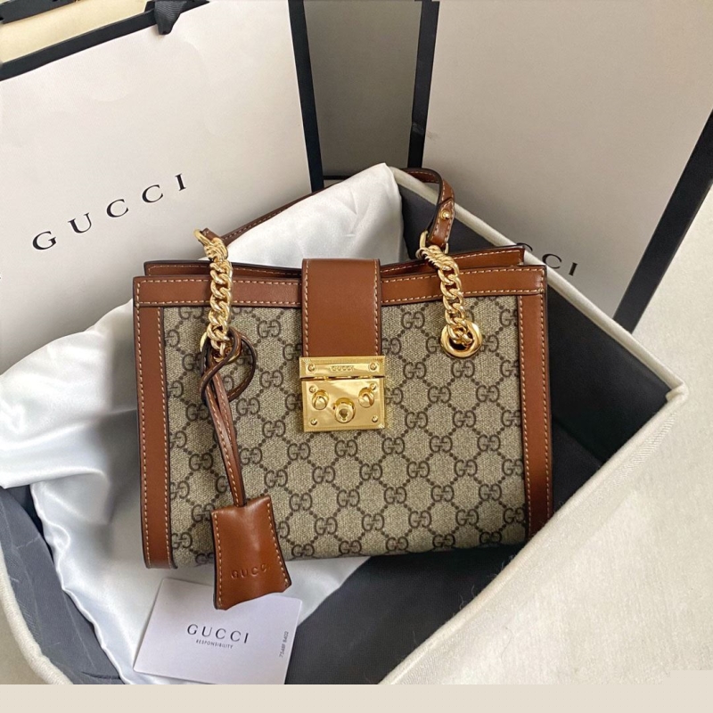 G*u*i shopping bags